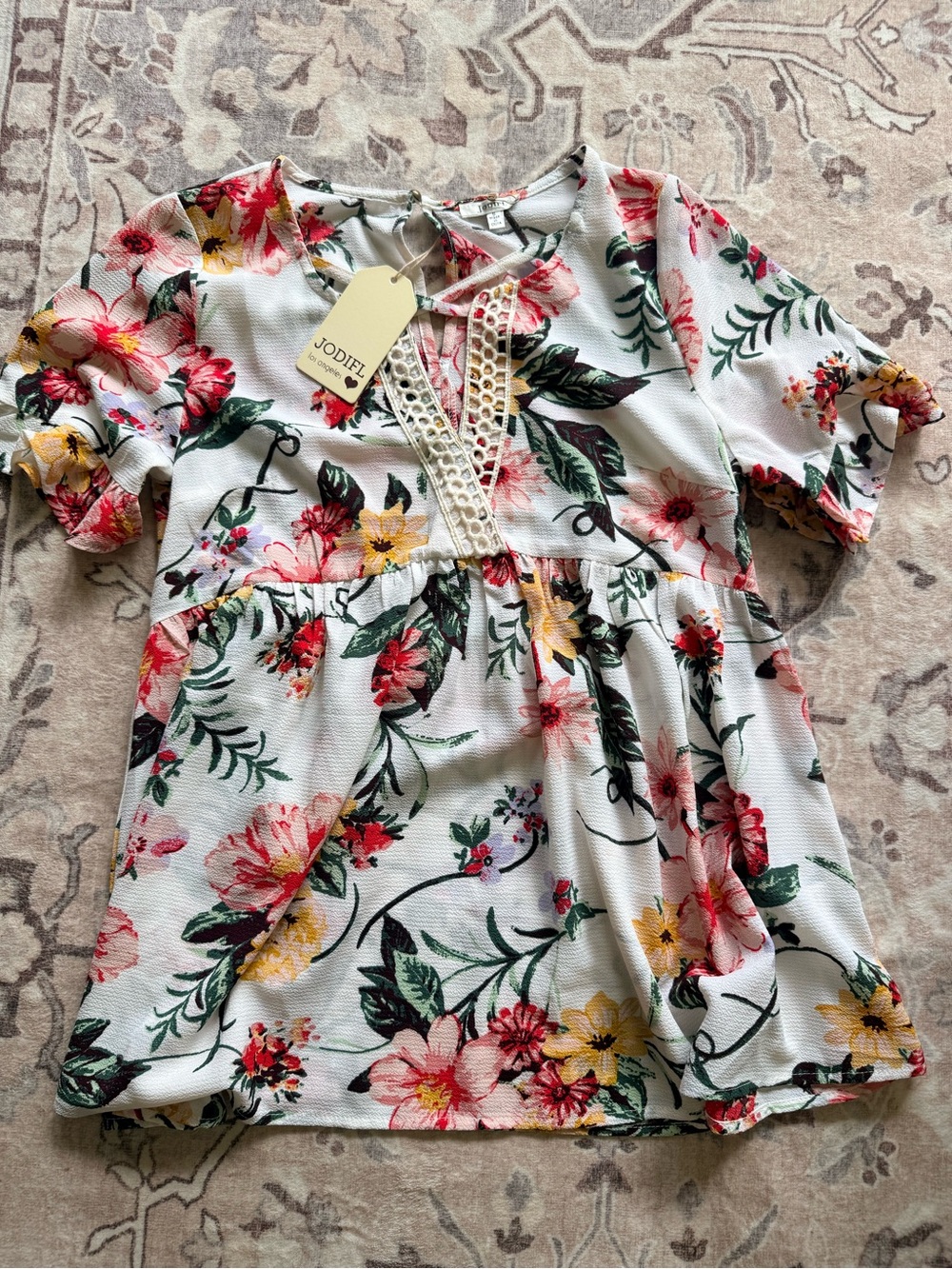 JODIFL White Floral Peplum Tunic with Lace V-Detail